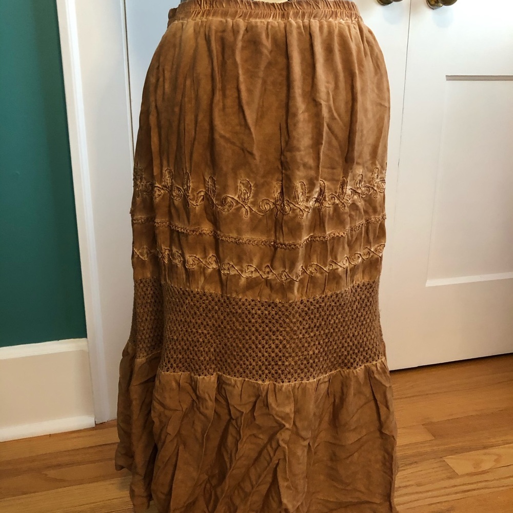 Cute camel colored skirt with unique detailing
